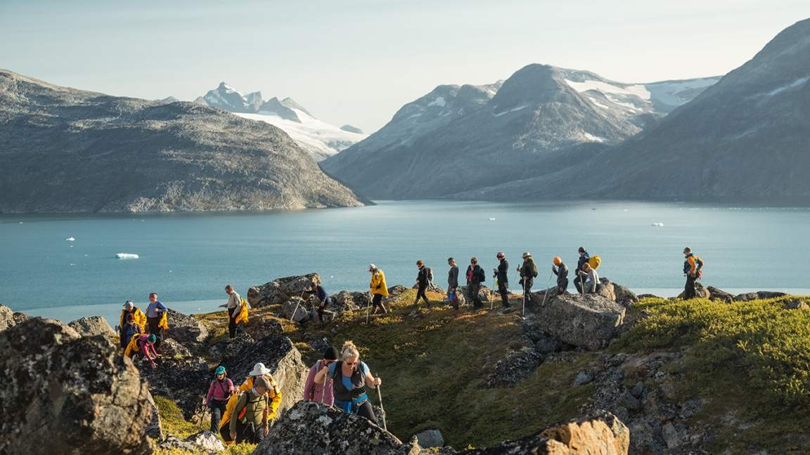 Guest hiking at Lindenow Fjord (Kangerlussuatsiaq), East Greenland