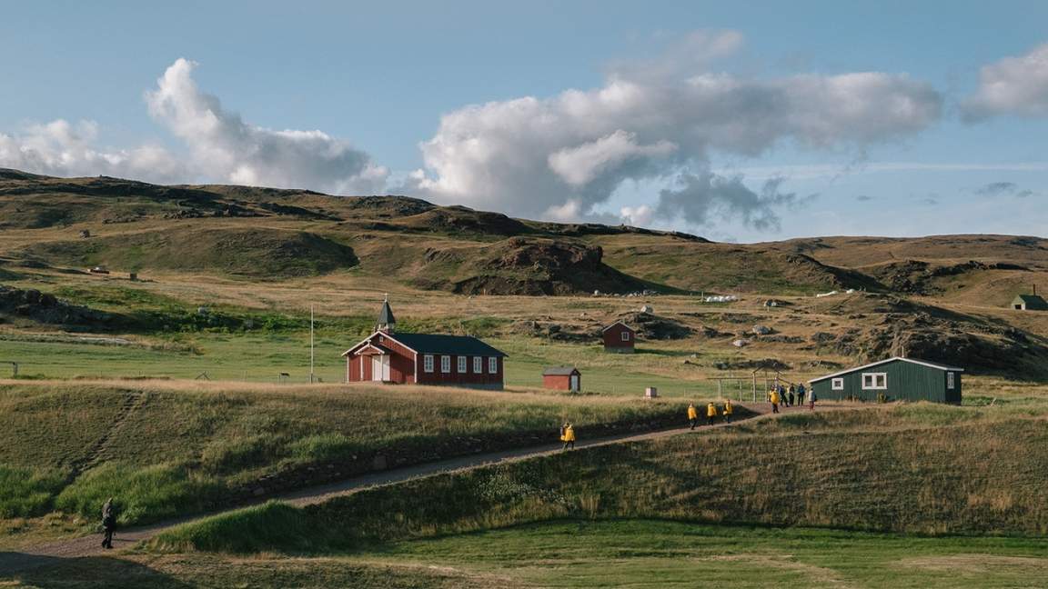 Guests exploring Brattahild, Greenland